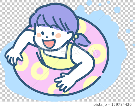 一個女孩在救生圈上玩耍。 一個女孩在救生圈上玩耍。 139784420
