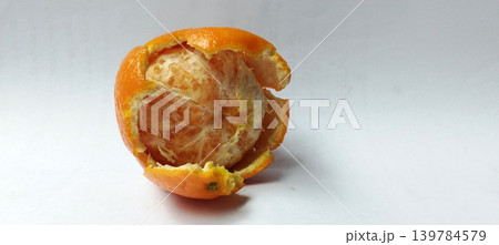 Fresh peeled orange fruit over white background. Fresh peeled orange fruit over white background. 139784579