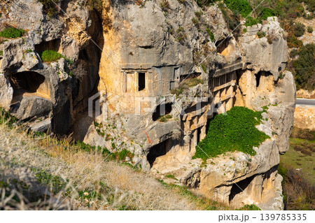Lycian graves carved into mountainside in Tlos, Turkey Lycian graves carved into mountainside in Tlos, Turkey 139785335