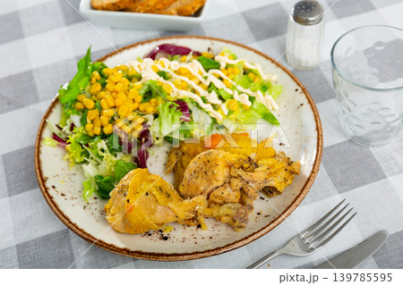 Roast chicken and mixed vegetable salad with canned corns Roast chicken and mixed vegetable salad with canned corns 139785595
