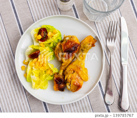 Appetizing chicken leg with salad Appetizing chicken leg with salad 139785767