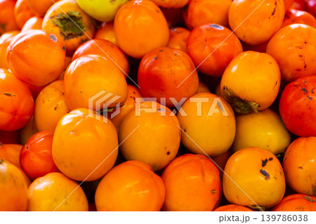 Many of fresh persimmons Many of fresh persimmons 139786038