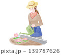 麦わら帽子を被り花に水をあげる女性 ガーデニング 麦わら帽子を被り花に水をあげる女性 ガーデニング 139787626