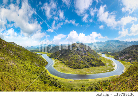 Amazing view of the Crnojevic river bend around green mountain peaks on a sunny day. 139789136