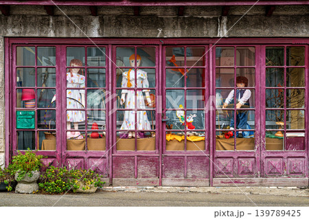 The Mounaques are life size dolls dressed in clothing in Campan, 139789425
