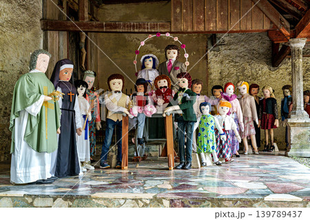 The Mounaques are life size dolls dressed in clothing in Campan, 139789437