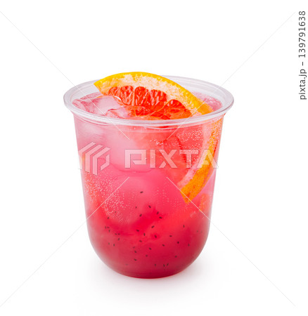 Delicious drink with ice and fruit sits in clear plastic cup Delicious drink with ice and fruit sits in clear plastic cup 139791638