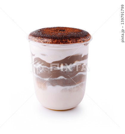 Delicious dessert served in a clear cup with layers of cream and chocolate Delicious dessert served in a clear cup with layers of cream and chocolate 139791799