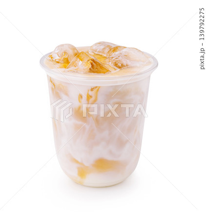 Cold drink with ice and coffee mix in a clear cup on a white background Cold drink with ice and coffee mix in a clear cup on a white background 139792275