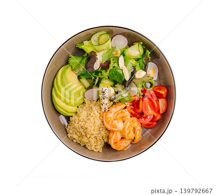 Fresh salad bowl with shrimp and quinoa served at a lunch table Fresh salad bowl with shrimp and quinoa served at a lunch table 139792667