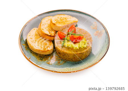 Baked vegetable tartare with toasted baguette slices isolated Baked vegetable tartare with toasted baguette slices isolated 139792685