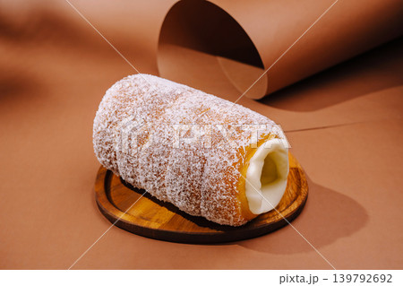 Traditional dessert placed on wooden board with simple background Traditional dessert placed on wooden board with simple background 139792692