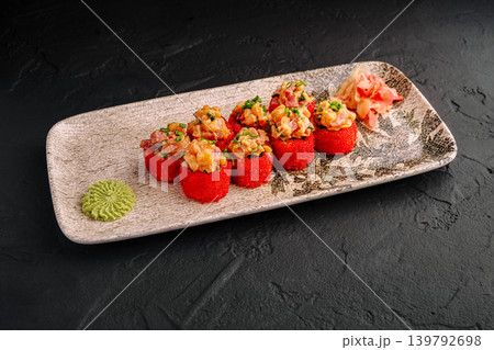 Delicious sushi served on a decorative plate for lunch at a sushi restaurant Delicious sushi served on a decorative plate for lunch at a sushi restaurant 139792698
