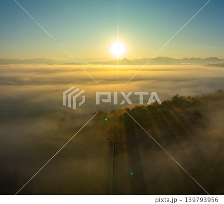 Aerial view amazing sunrise above the sea of mist in front Thi Lor Su waterfall. Aerial view amazing sunrise above the sea of mist in front Thi Lor Su waterfall. 139793956
