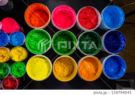 Aerial View of Colorful Plastisol Ink Jars in a Factory Setting Aerial View of Colorful Plastisol Ink Jars in a Factory Setting 139794045