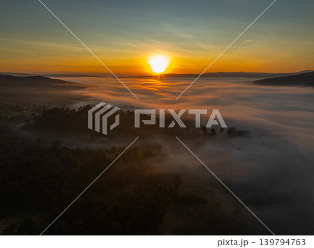 Aerial view of Golden Sky Over Nan Dramatic Ridge Road Aerial view of Golden Sky Over Nan Dramatic Ridge Road 139794763