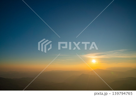 Aerial view of Golden Sky Over Nan Dramatic Ridge Road Aerial view of Golden Sky Over Nan Dramatic Ridge Road 139794765