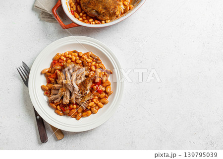 Oven Baked Pork meat and Beans on plate Oven Baked Pork meat and Beans on plate 139795039