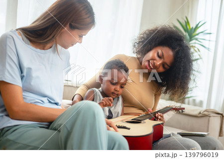Warm sunlight bathes a cozy living room 139796019