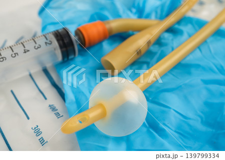 Foley urinary catheter with urine bag for disability or patient in hospital. 139799334