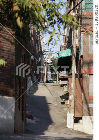 Urban Alley with Construction and Overhead Wires 139800220