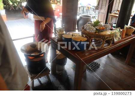 Traditional Wok Cooking in Open Kitchen 139800273