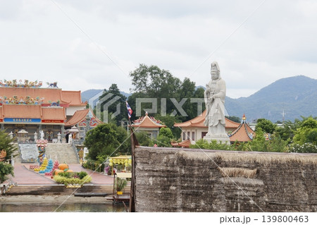 Temple Complex with Statue and Traditional Architecture 139800463