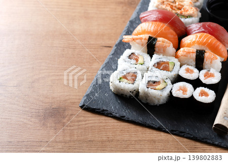 Fresh sushi assortment with salmon maki and nigiri 139802883