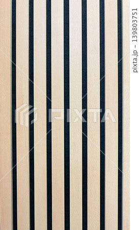 Minimalist interior background featuring two shades of wooden acoustic slat panels with clean lines Minimalist interior background featuring two shades of wooden acoustic slat panels with clean lines 139803751