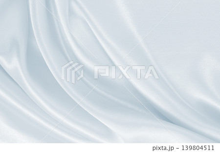 Smooth elegant grey silk or satin luxury cloth as wedding background. Luxurious background design Smooth elegant grey silk or satin luxury cloth as wedding background. Luxurious background design 139804511