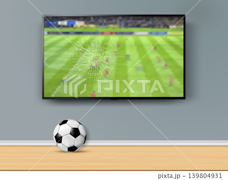 TV screen smashed by a soccer ball with a football match broadcast TV screen smashed by a soccer ball with a football match broadcast 139804931
