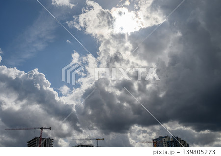 Sunlight breaking through cumulonimbus clouds Sunlight breaking through cumulonimbus clouds 139805273