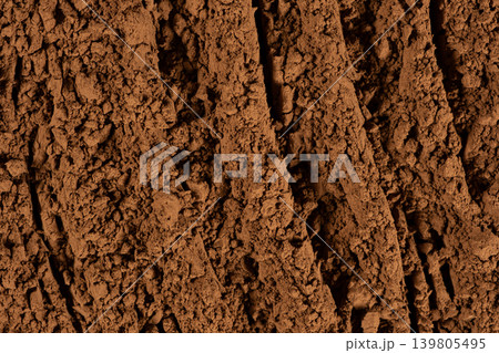Raw organic cocoa powder texture background for food design Raw organic cocoa powder texture background for food design 139805495