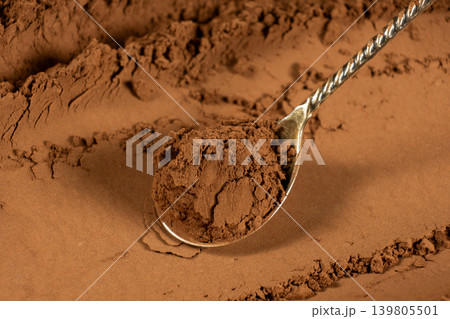 Aromatic cacao powder scoop for baking and culinary design Aromatic cacao powder scoop for baking and culinary design 139805501