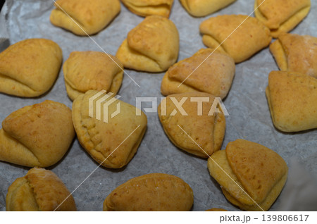 Freshly Baked Goose Feet Cookies on Baking Sheet with Parchment Freshly Baked Goose Feet Cookies on Baking Sheet with Parchment 139806617