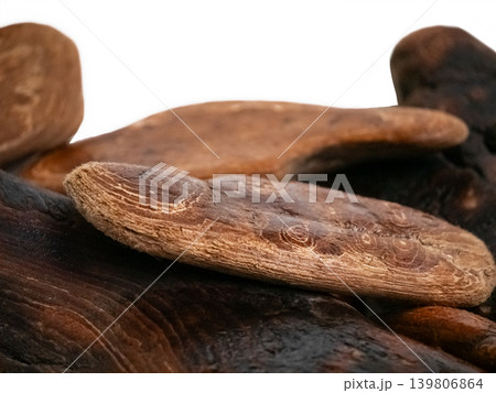 Textured driftwood collection isolated on a white background. Natural organic material for ecological design. Textured driftwood collection isolated on a white background. Natural organic material for ecological design. 139806864