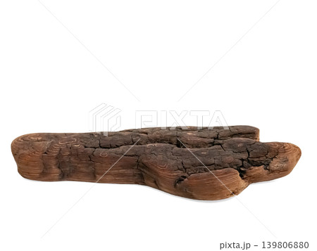 Piece of natural weathered driftwood on a white surface for decorative purposes. Isolated wood element for design projects and rustic concepts. Piece of natural weathered driftwood on a white surface for decorative purposes. Isolated wood element for design projects and rustic concepts. 139806880
