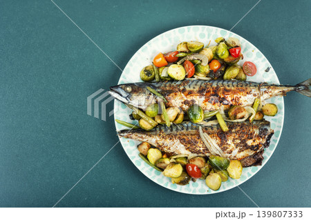 Grilled Mackerel with Pineapple Garnish Grilled Mackerel with Pineapple Garnish 139807333