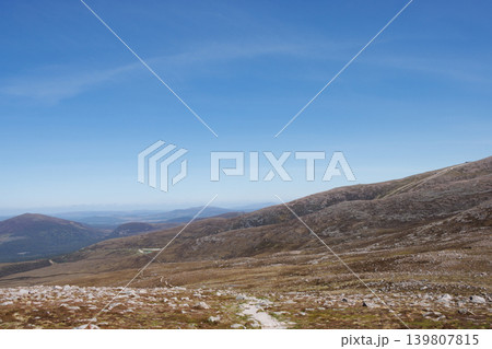 Footpath from summit of Cairngorm mountains into valley, Scotland Footpath from summit of Cairngorm mountains into valley, Scotland 139807815