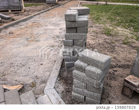 Stacked Concrete Paving Bricks for Walkway Stacked Concrete Paving Bricks for Walkway 139807819