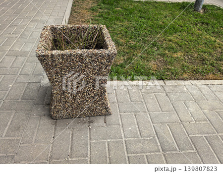 Square Concrete Pebble Texture Planter on Walkway Square Concrete Pebble Texture Planter on Walkway 139807823