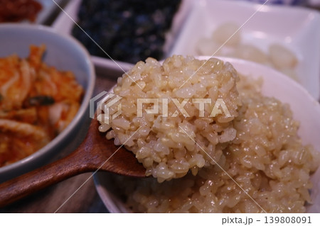 Spoonful of Steamed Rice with Korean Side Dishes 139808091