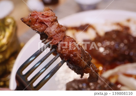 Juicy Steak on Fork Close-up Juicy Steak on Fork Close-up 139808110