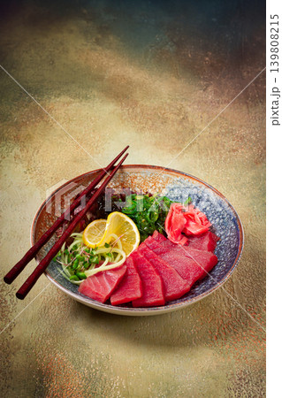tuna sashimi with daikon and wakame salad, pickled ginger, in a bowl, tuna sashimi with daikon and wakame salad, pickled ginger, in a bowl, 139808215