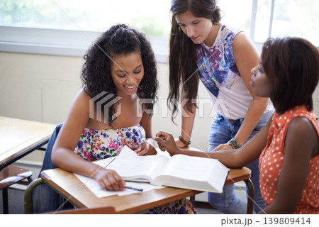 Women, students and textbook reading in university for group assignment for project, education or learning. Female people, friends and notes in college classroom for academic research, exam or course Women, students and textbook reading in university for group assignment for project, education or learning. Female people, friends and notes in college classroom for academic research, exam or course 139809414
