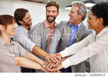 Collaboration, smile and business people with hands in huddle at office for meeting, motivation or support. Teamwork, goals and target with happy employee group in workplace for celebration of bonus Collaboration, smile and business people with hands in huddle at office for meeting, motivation or support. Teamwork, goals and target with happy employee group in workplace for celebration of bonus 139809417