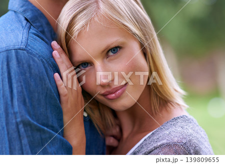 Portrait, love and couple with face on chest outdoor in garden, park or nature closeup for dating. Anniversary, honeymoon or romance with young woman and boyfriend closeup for summer vacation Portrait, love and couple with face on chest outdoor in garden, park or nature closeup for dating. Anniversary, honeymoon or romance with young woman and boyfriend closeup for summer vacation 139809655