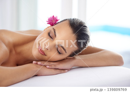 Woman, massage and organic treatment at spa, wellness and beauty therapy for body care. Female person, calm and serene or dermatology, cosmetics and resting at resort hotel and peace or relaxing Woman, massage and organic treatment at spa, wellness and beauty therapy for body care. Female person, calm and serene or dermatology, cosmetics and resting at resort hotel and peace or relaxing 139809769