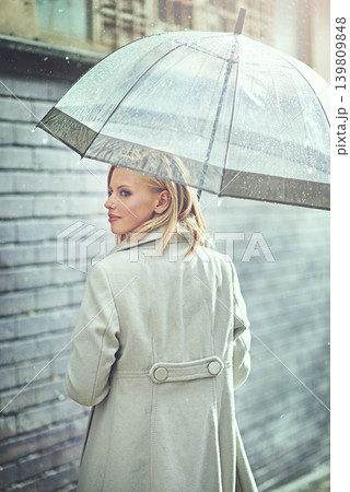 Woman, umbrella and walking with rain in city, thinking or ideas with cover, weather and memory in winter. Person, outdoor and road with travel, journey or commute with water on sidewalk in Cape Town Woman, umbrella and walking with rain in city, thinking or ideas with cover, weather and memory in winter. Person, outdoor and road with travel, journey or commute with water on sidewalk in Cape Town 139809848