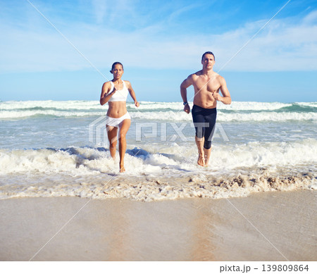 Running, beach and couple with fitness, waves and weekend break with cardio and training for health. Runners, seaside and man with woman and support with practice and activity for wellness and hobby Running, beach and couple with fitness, waves and weekend break with cardio and training for health. Runners, seaside and man with woman and support with practice and activity for wellness and hobby 139809864